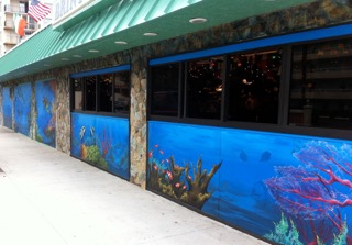 Ocean themed mural with rich blues and gorgeous coral of all colors.
