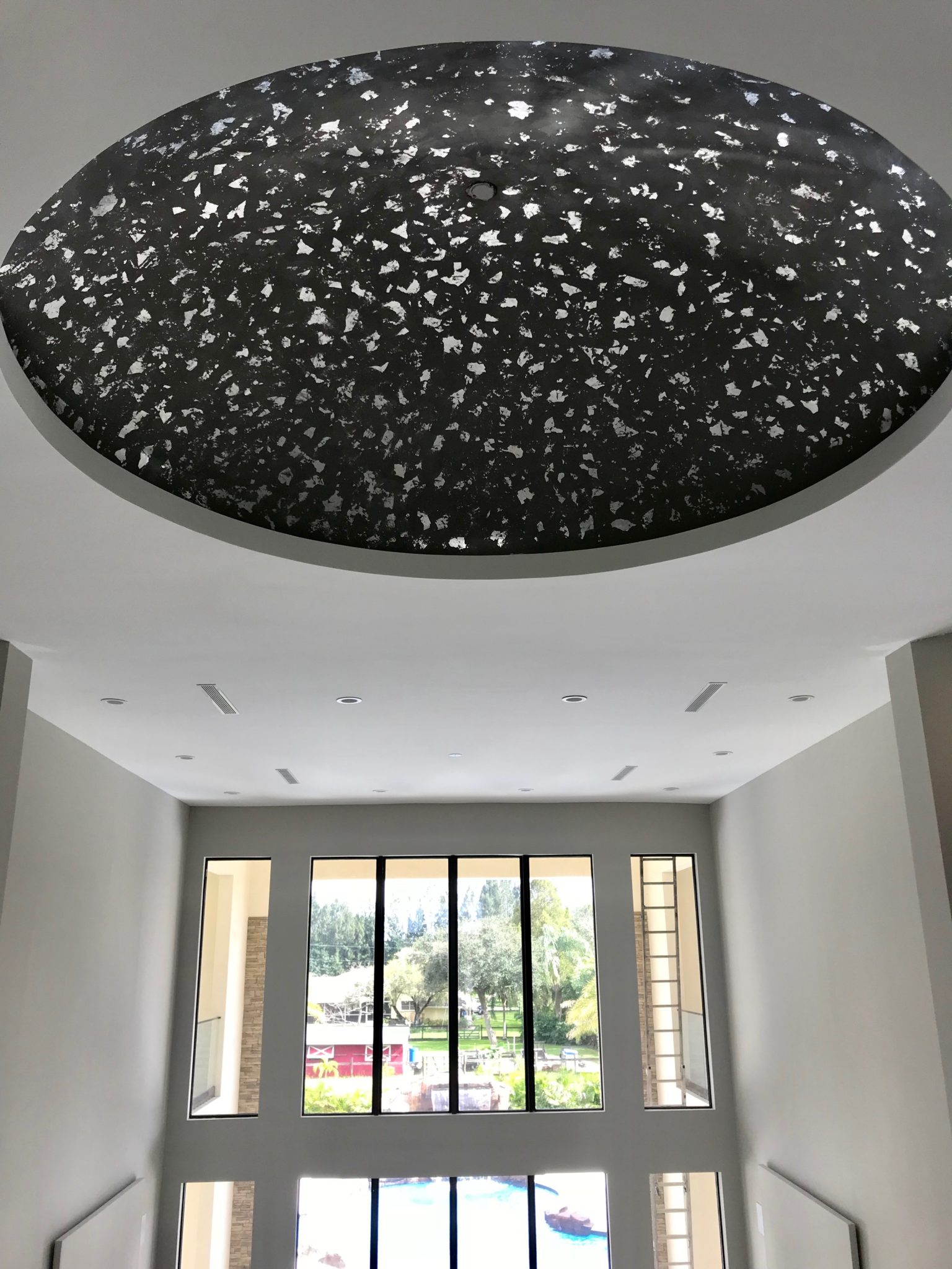 Silver Leaf creatively placed in a 30ft dome ceiling in Southwest Ranches.