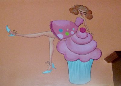 Contemporary mural of girl on cupcake
