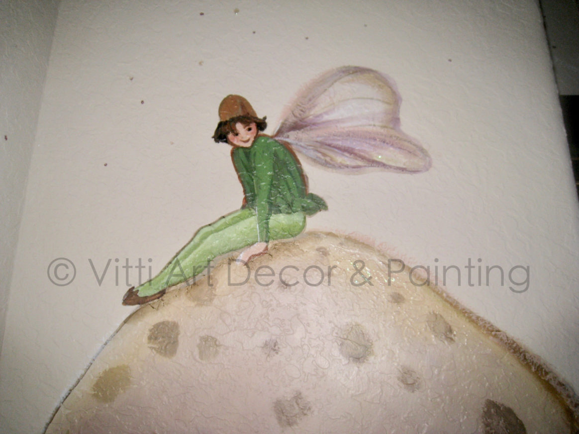 Youthful Fairy with wings on large fantastical mushroom